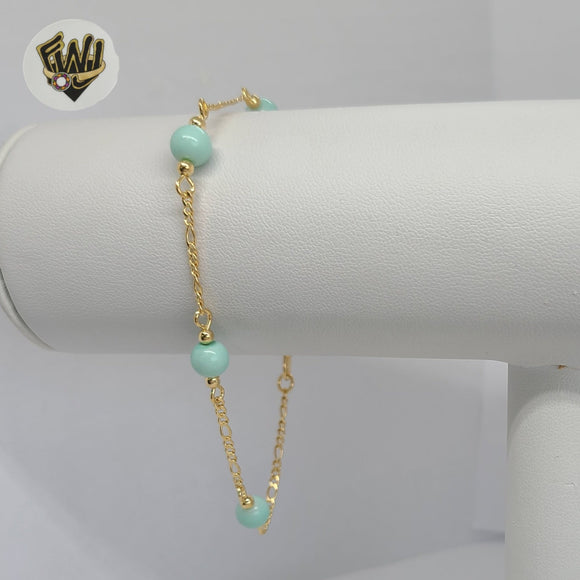 (1-3901-K) Gold Laminate - 6mm Turquoise Beads Bracelet - 7.5